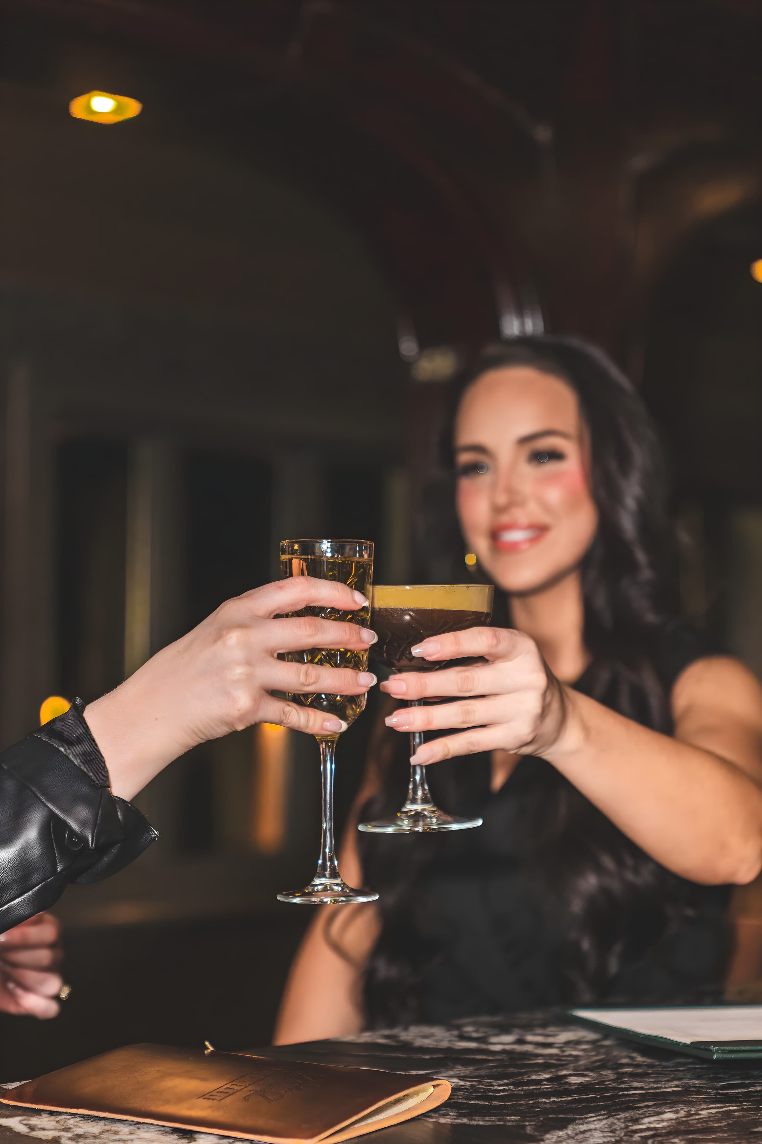 An espresso martini toast at the bar