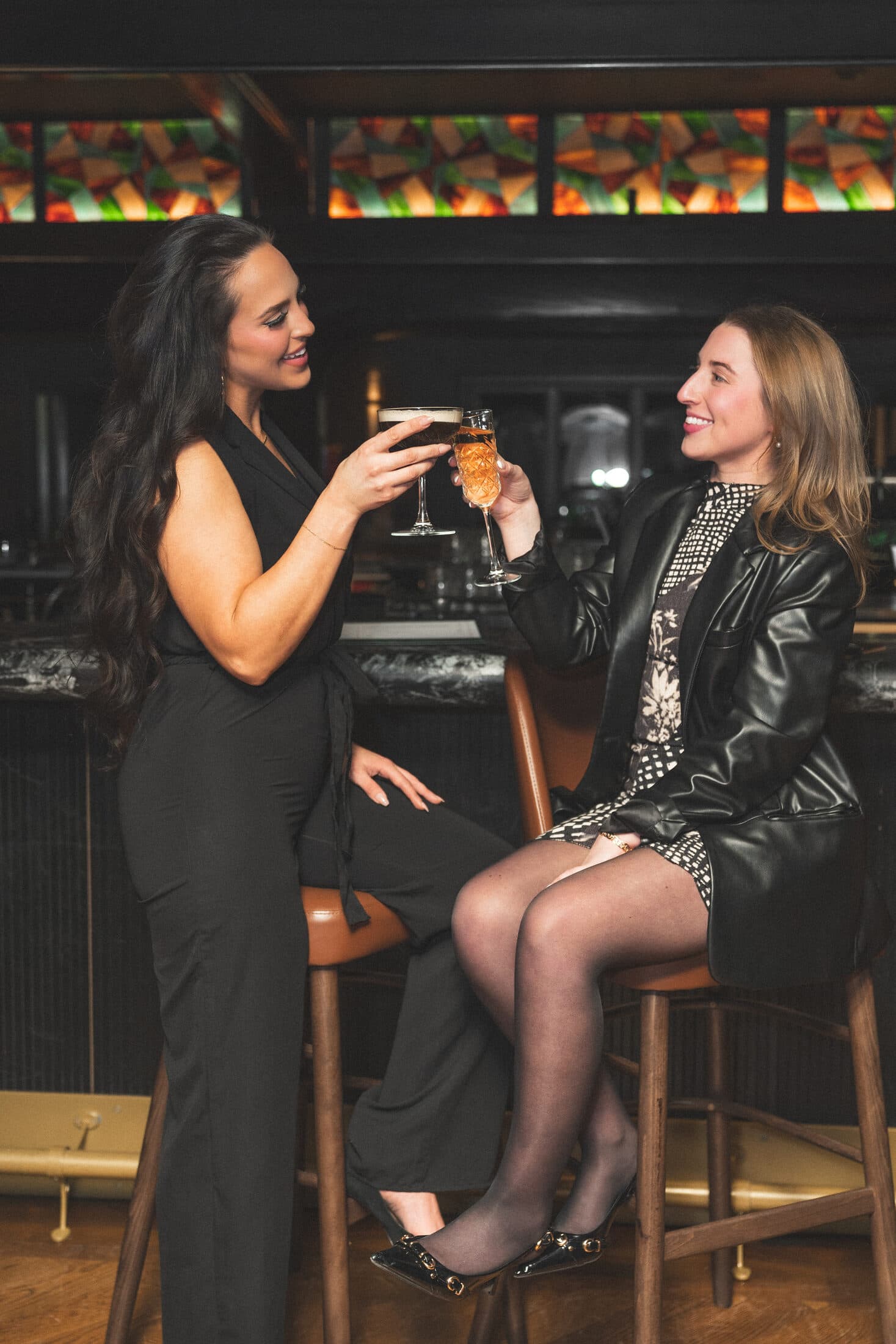 Friends toasting at the Parlor Bar