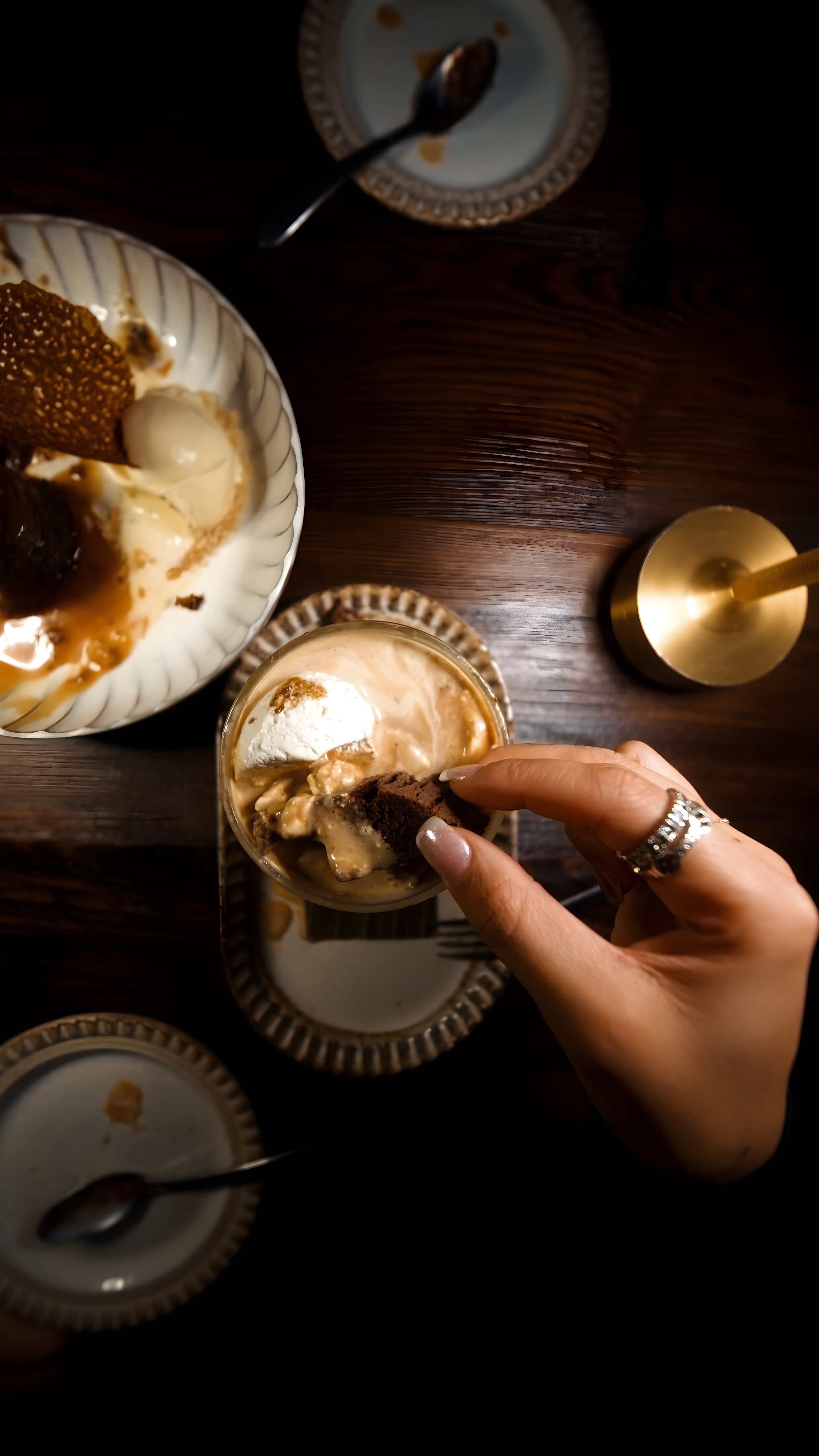 Dessert on a candlelit table at Ember & Eagle