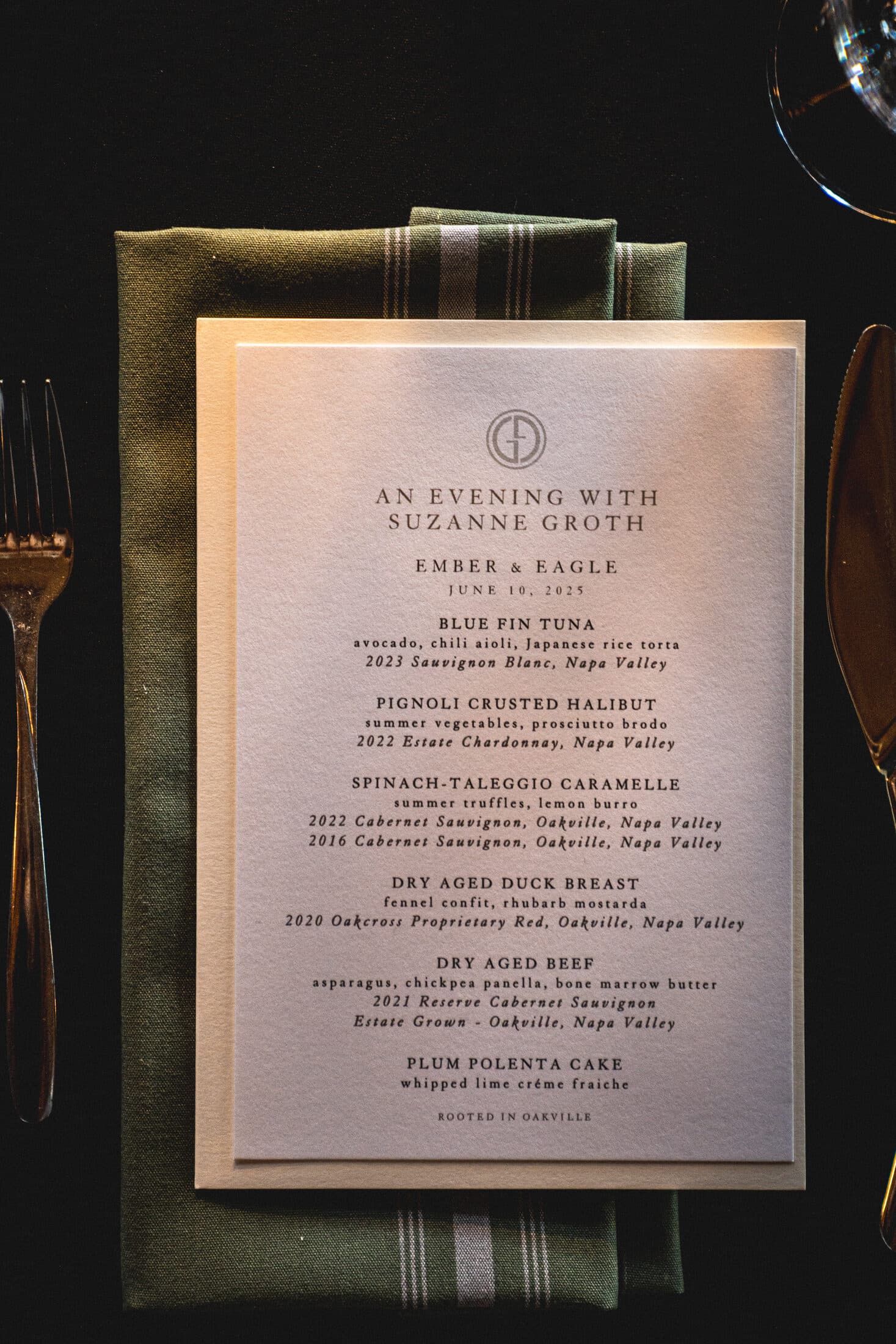 Printed wine dinner menu on the table at Ember & Eagle